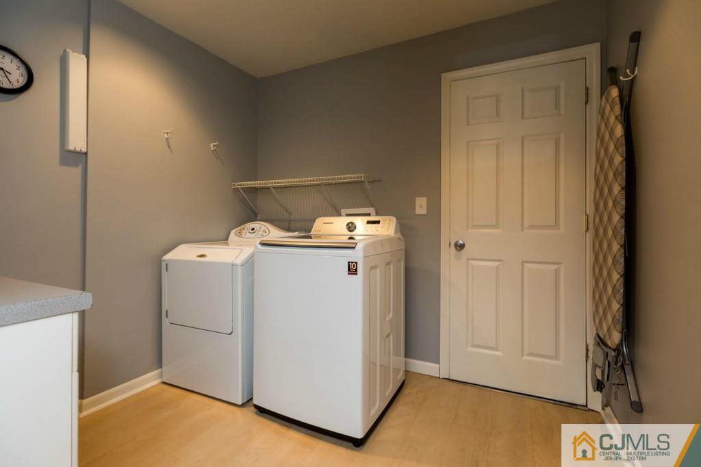 104 South Cliff Road Colonia, NJ 07067 - Photo 12 of 25 a utility room with dryer and washer