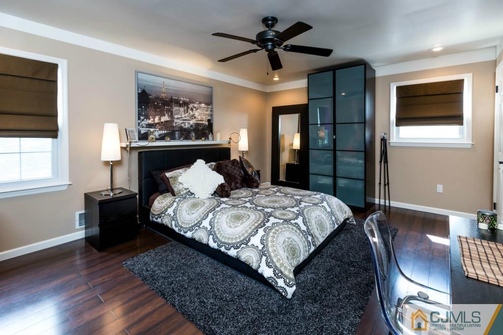 104 South Cliff Road Colonia, NJ 07067 - Photo 17 of 25 a bedroom with bed and window