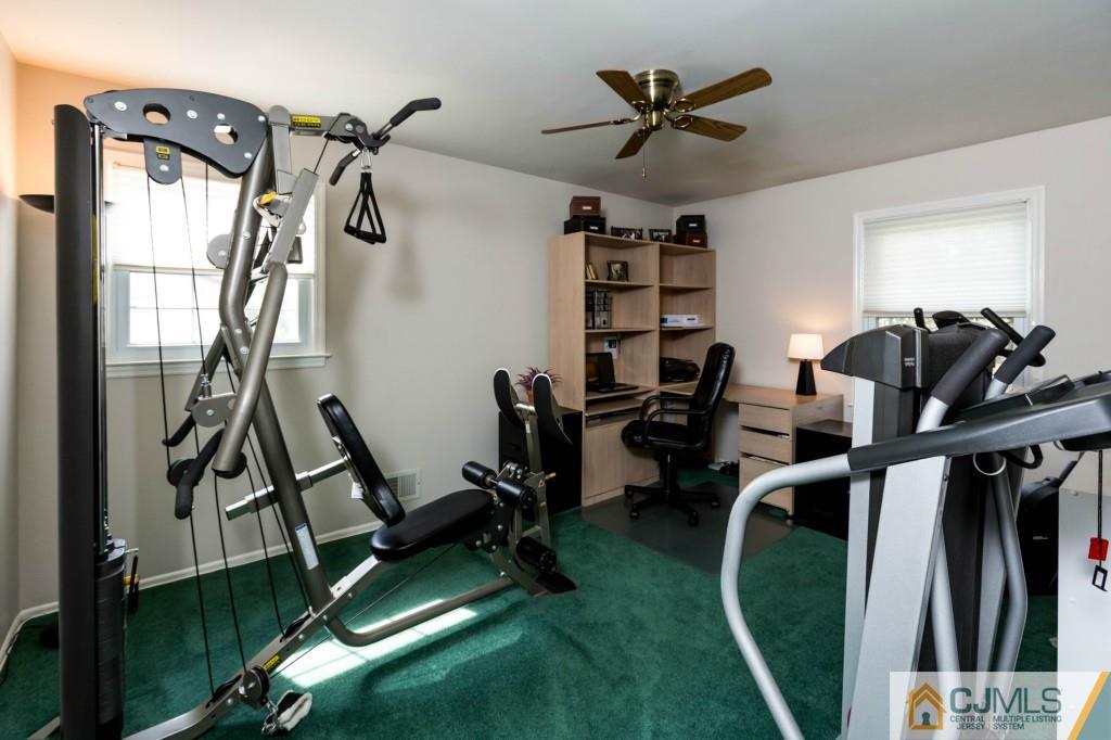 104 South Cliff Road Colonia, NJ 07067 - Photo 20 of 25 a view of a room with gym equipment