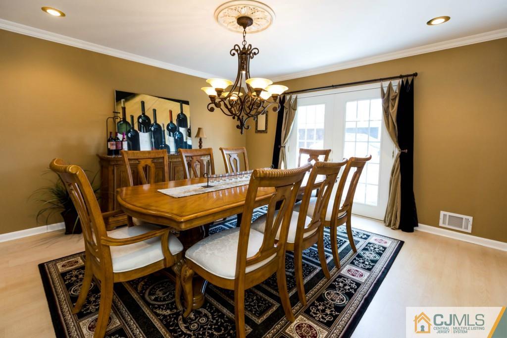 104 South Cliff Road Colonia, NJ 07067 - Photo 4 of 25 a dining room with furniture and window