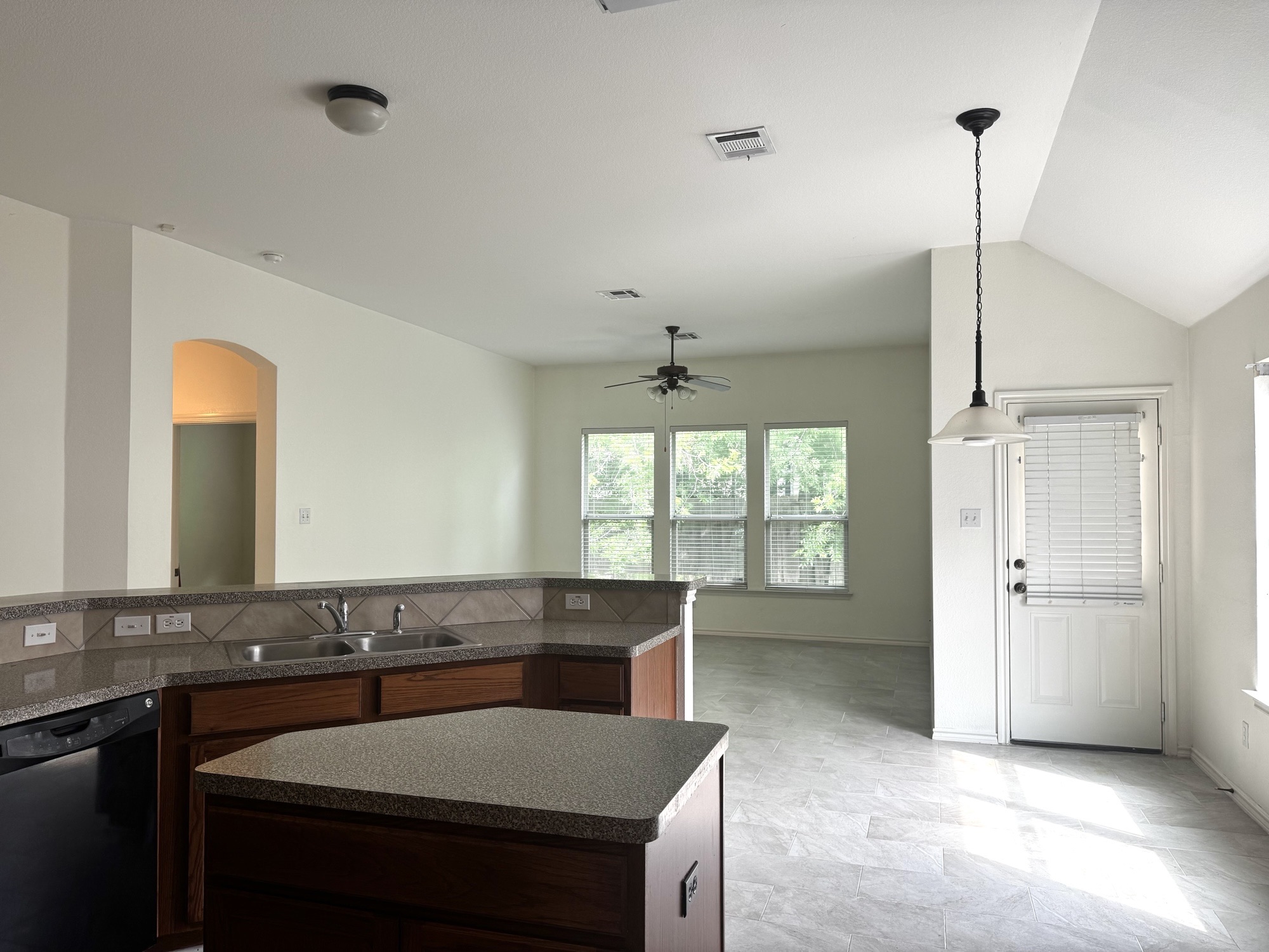 304 Valona Loop Round Rock, TX 78681 - Photo 8 of 15 Family room from kitchen view. Open concept with a lot of natural light
