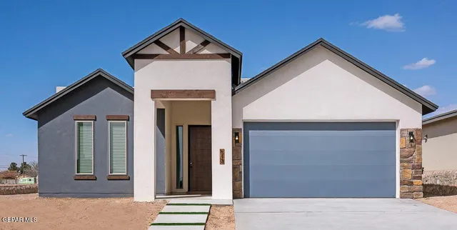 a view of a house with a street