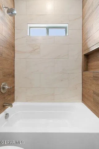 a bathroom with a bathtub