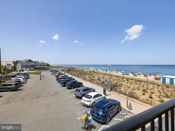 a view of a balcony with an ocean view