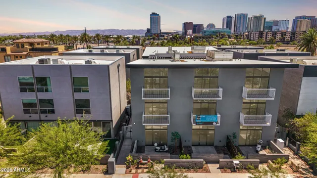 a view of a city with tall buildings