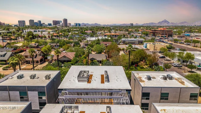 an aerial view of a city with lots of residential buildings