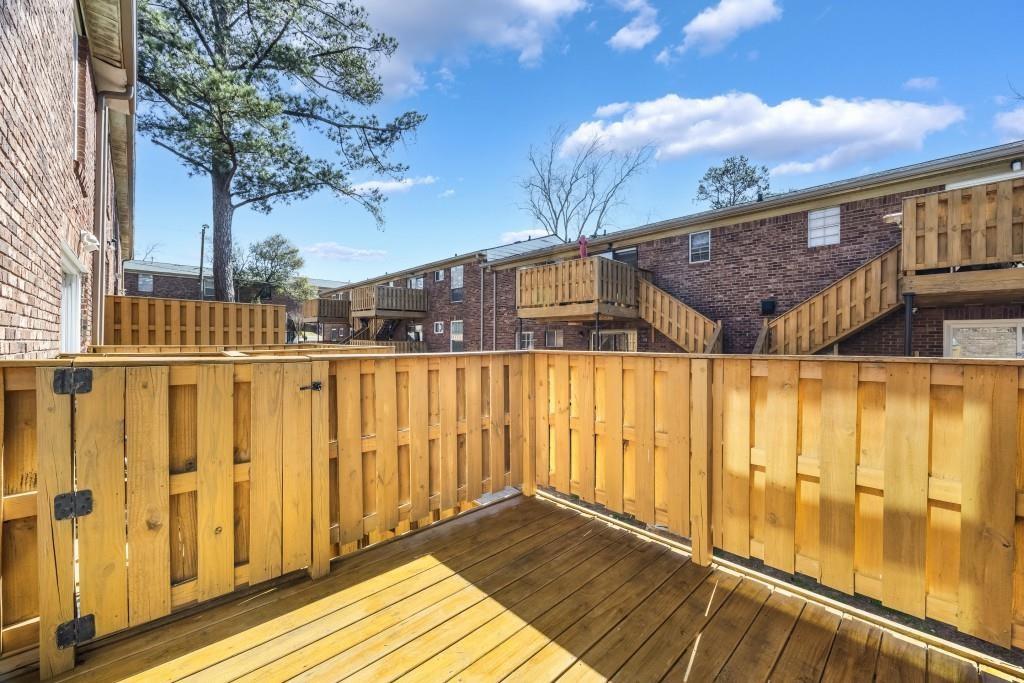5629 Kingsport Drive, Unit 11 Atlanta, GA 30342 - Photo 25 of 52 a view of wooden balcony