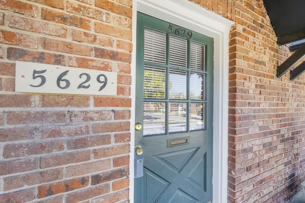 5629 Kingsport Drive, Unit 11 Atlanta, GA 30342 - Photo 3 of 52 a view of a door and brick wall