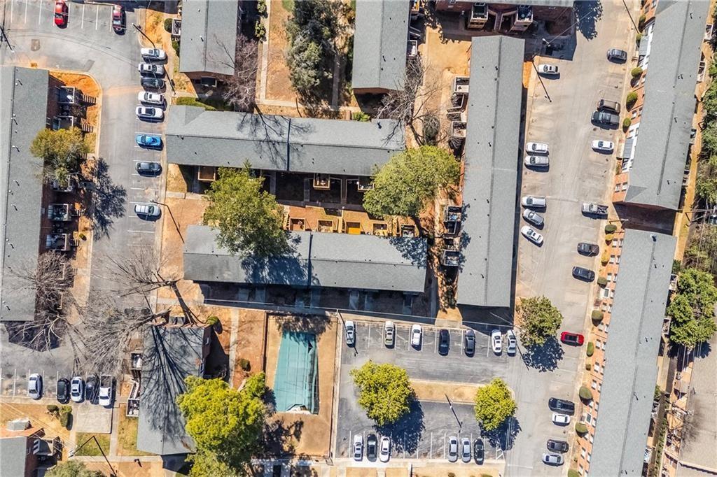 5629 Kingsport Drive, Unit 11 Atlanta, GA 30342 - Photo 39 of 52 an aerial view of residential houses with outdoor space