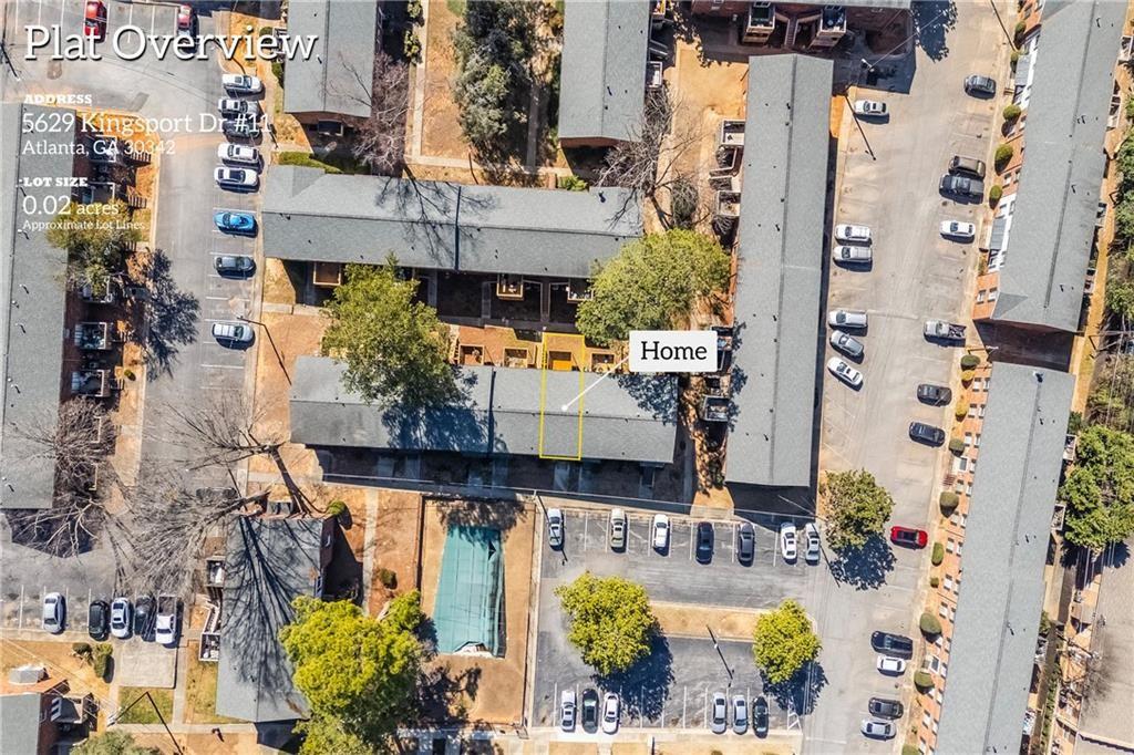 5629 Kingsport Drive, Unit 11 Atlanta, GA 30342 - Photo 40 of 52 an aerial view of residential houses with outdoor space