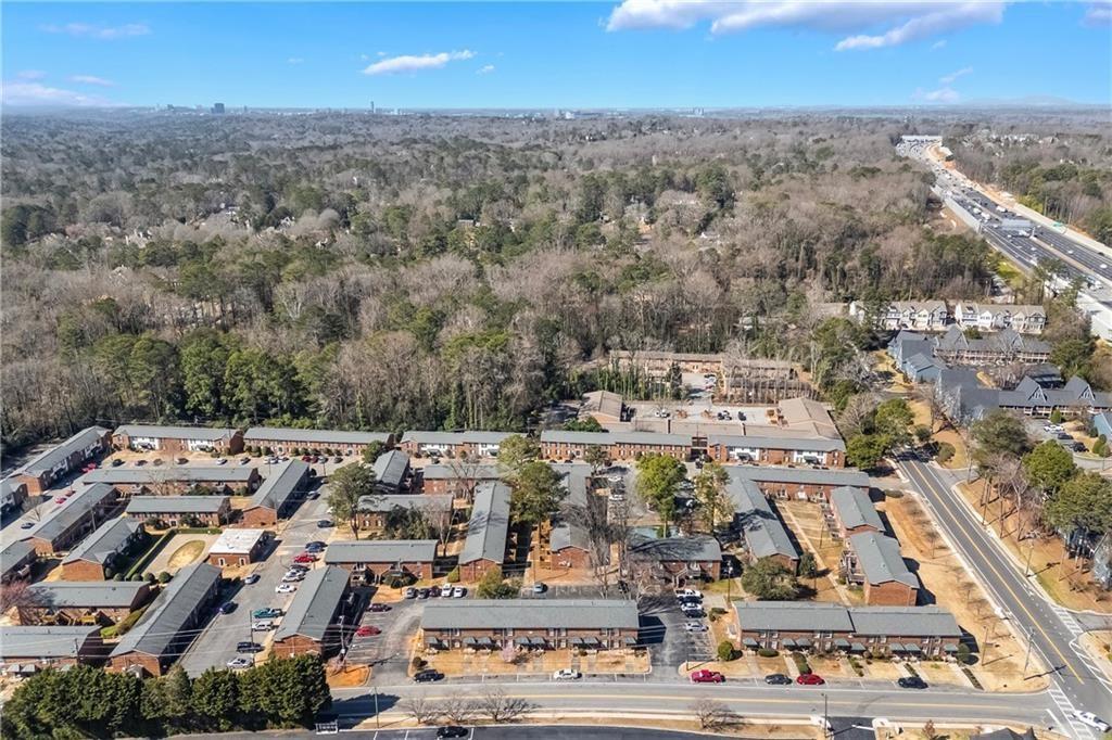 5629 Kingsport Drive, Unit 11 Atlanta, GA 30342 - Photo 47 of 52 an aerial view of a city