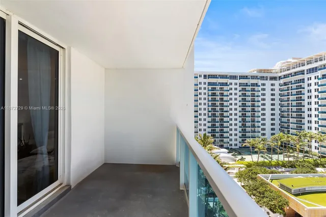 a view of a ocean from a balcony