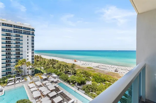 a view of balcony with a yard