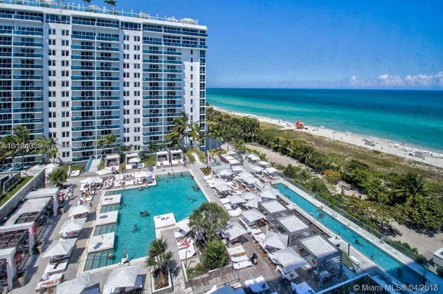 a view of pool with patio