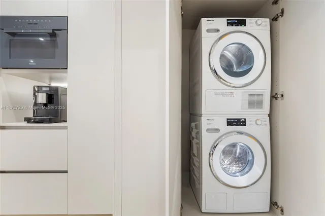 a utility room with dryer and washer