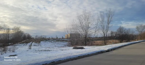 a view of a backyard of a house