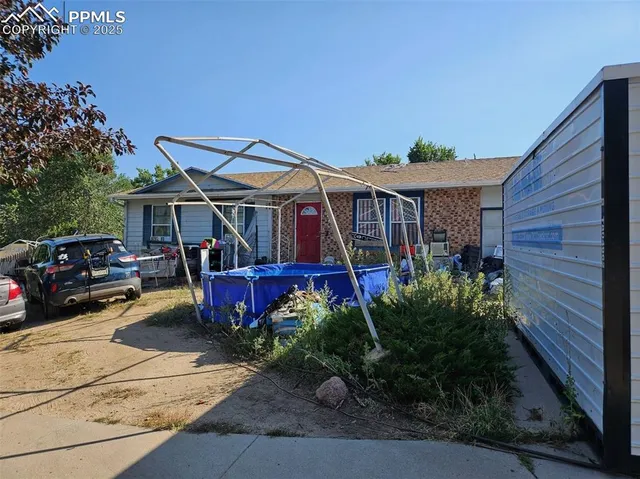 a view of a house with a patio