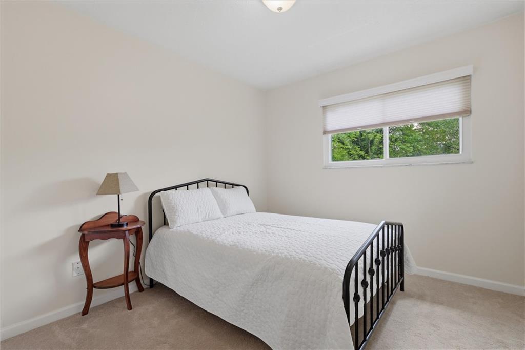134 Stucky Road Renfrew, PA 16053 - Photo 17 of 32 a bedroom with a bed and a window