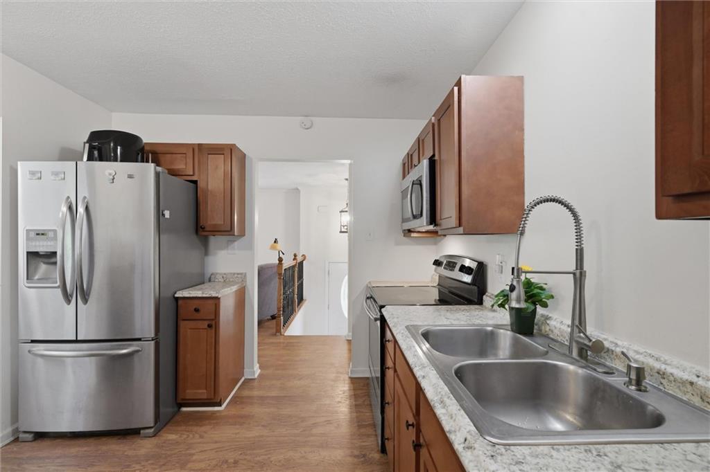134 Stucky Road Renfrew, PA 16053 - Photo 10 of 32 a kitchen with refrigerator and stainless steel appliances
