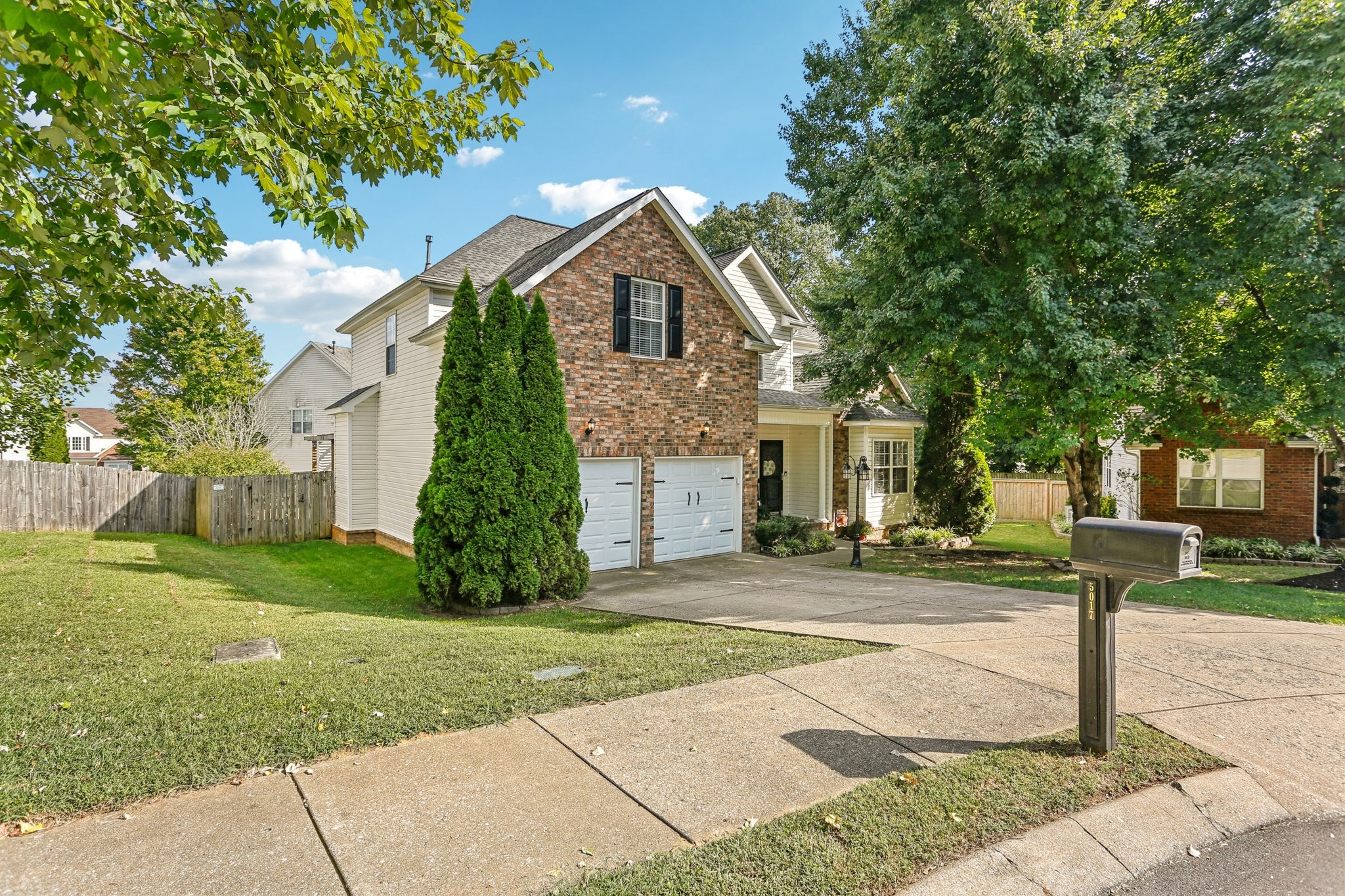 5017 Saunders Terrace Spring Hill, TN 37174 - Photo 2 of 52 a front view of a house with a yard