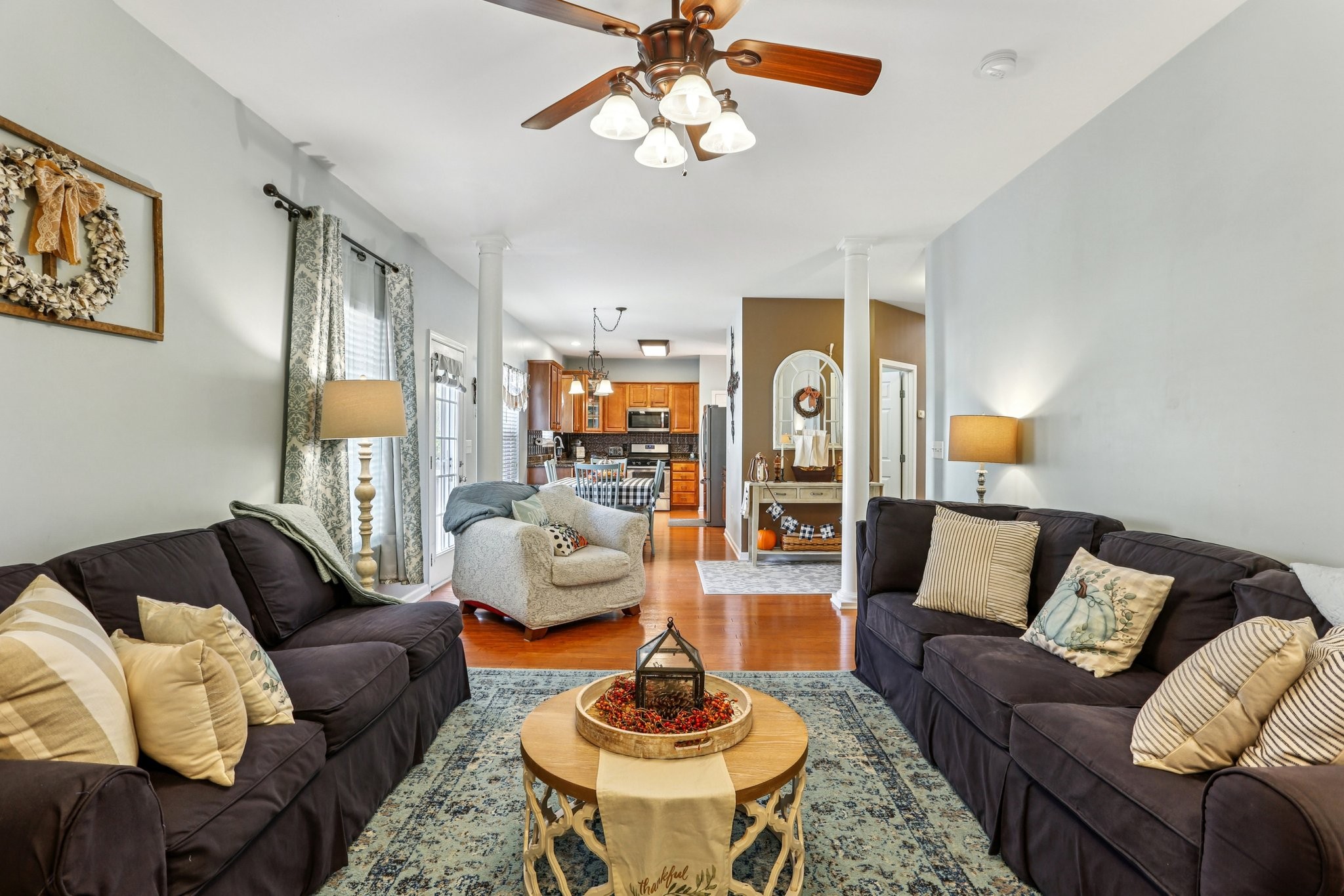 5017 Saunders Terrace Spring Hill, TN 37174 - Photo 22 of 52 a living room with furniture and a large window