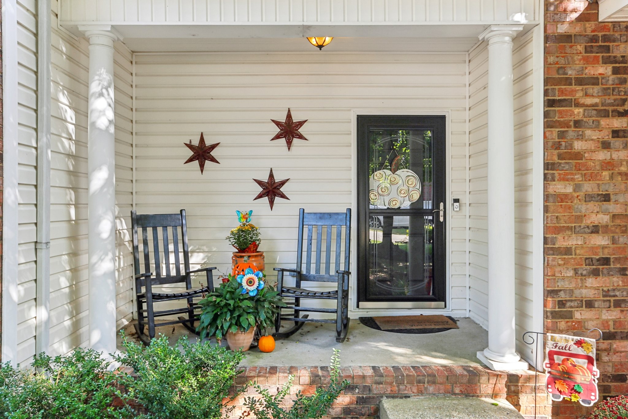 5017 Saunders Terrace Spring Hill, TN 37174 - Photo 4 of 52 a potted plant sitting in front of a door