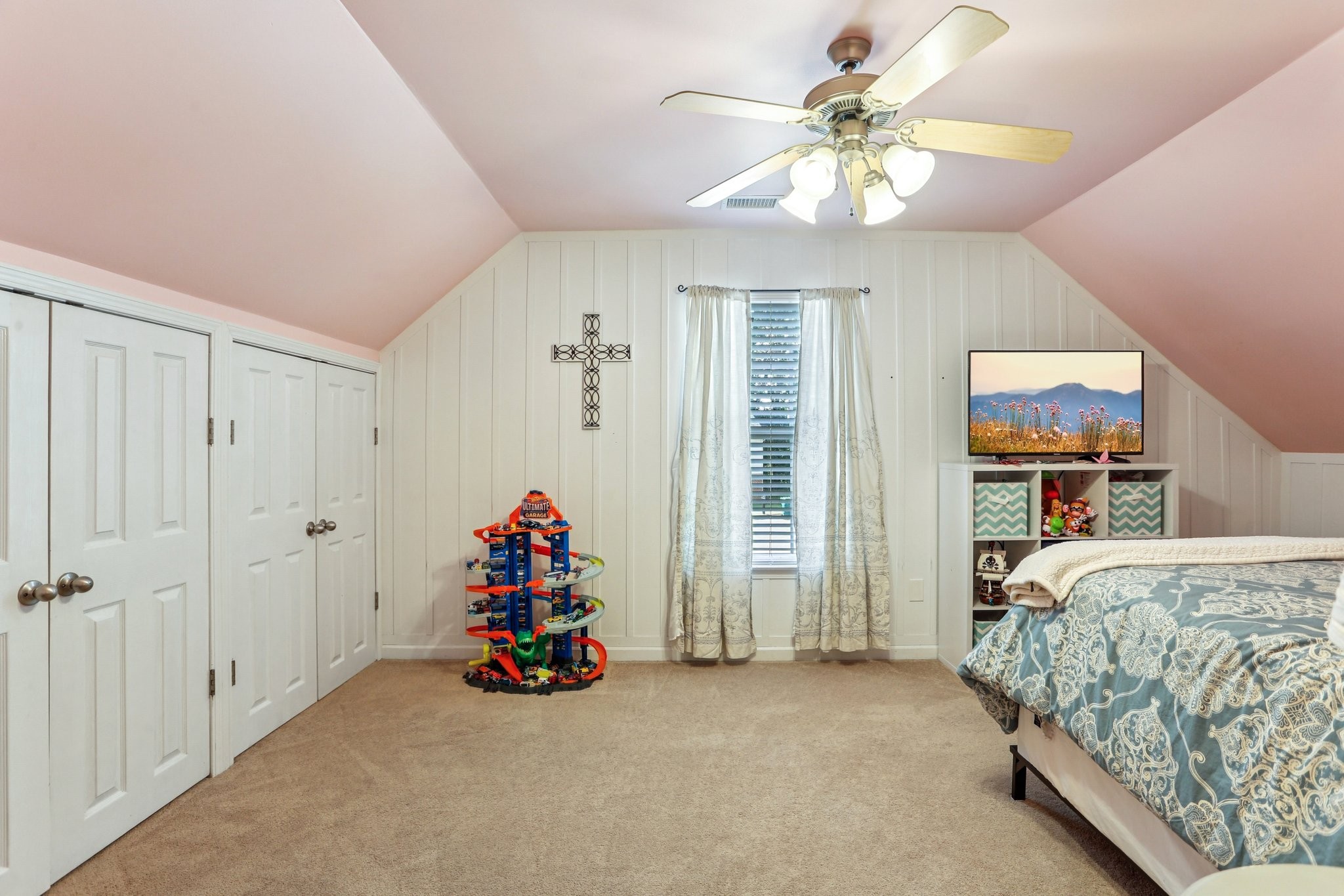 5017 Saunders Terrace Spring Hill, TN 37174 - Photo 41 of 52 a bedroom with a bed and a chandelier