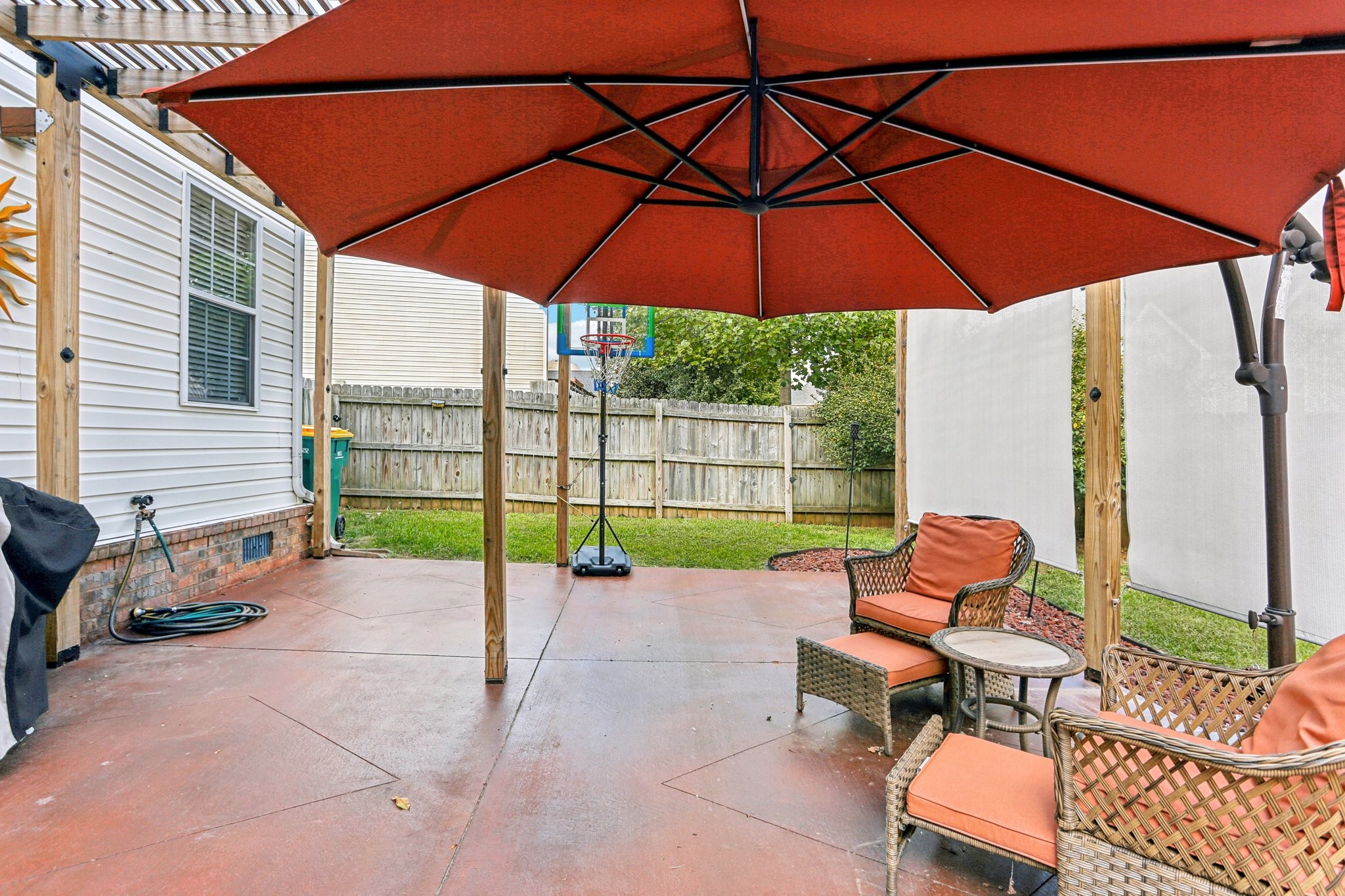 5017 Saunders Terrace Spring Hill, TN 37174 - Photo 42 of 52 a view of backyard with seating space and wooden floor