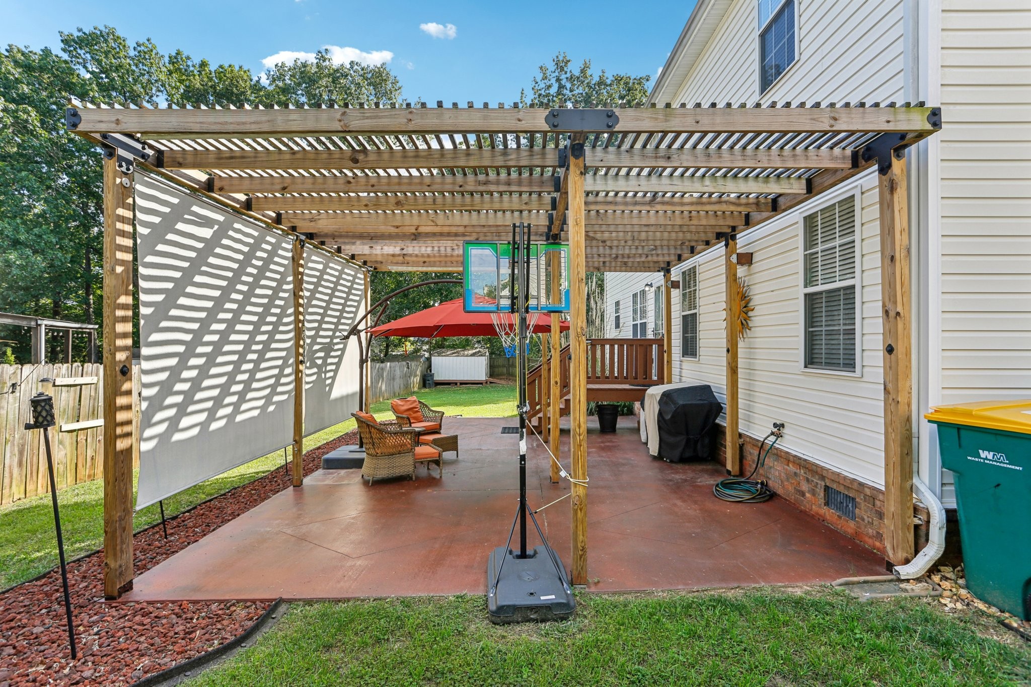 5017 Saunders Terrace Spring Hill, TN 37174 - Photo 46 of 52 a roof deck with table and chairs and potted plants