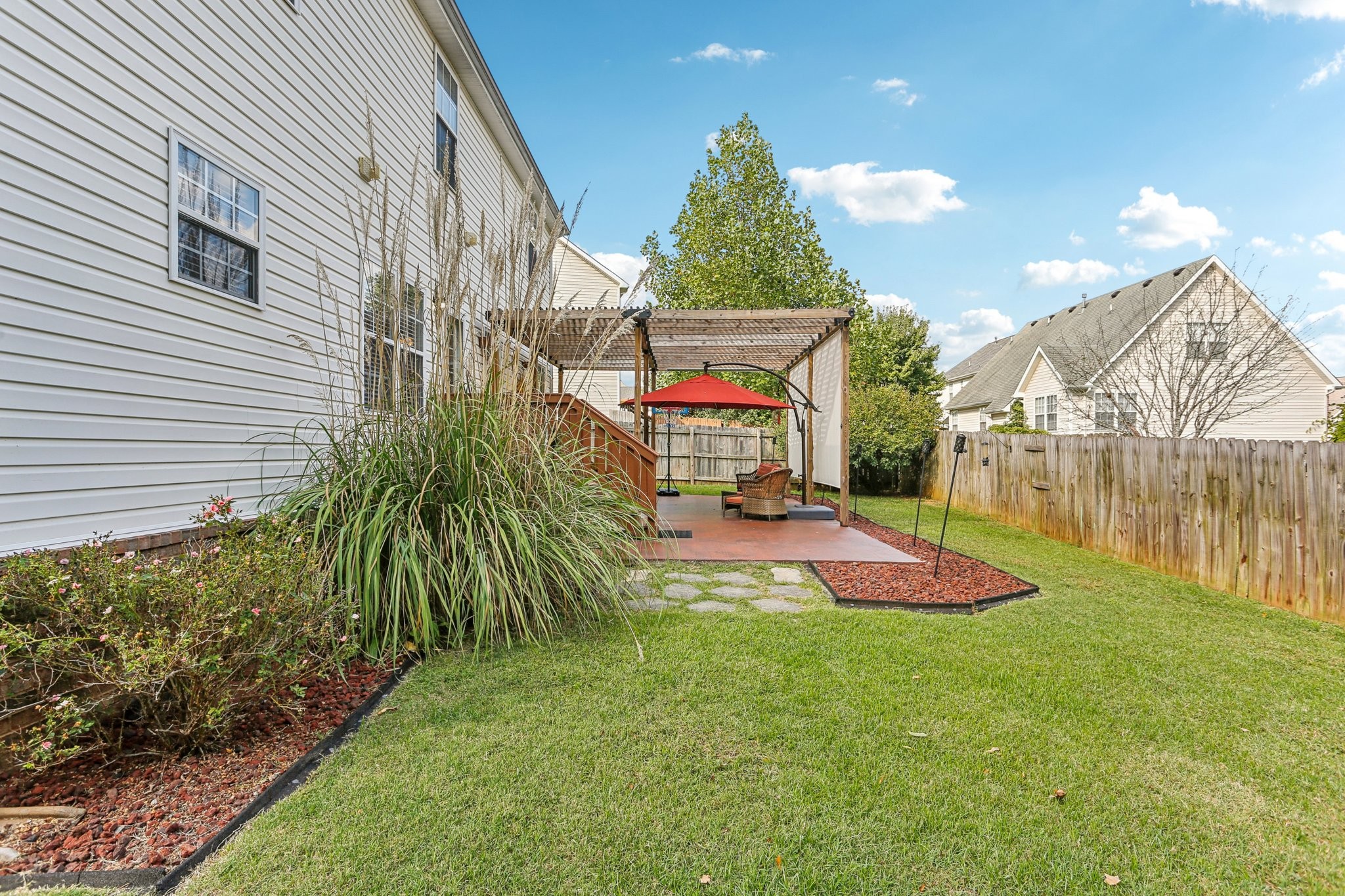 5017 Saunders Terrace Spring Hill, TN 37174 - Photo 47 of 52 a view of swimming pool with a patio and a yard