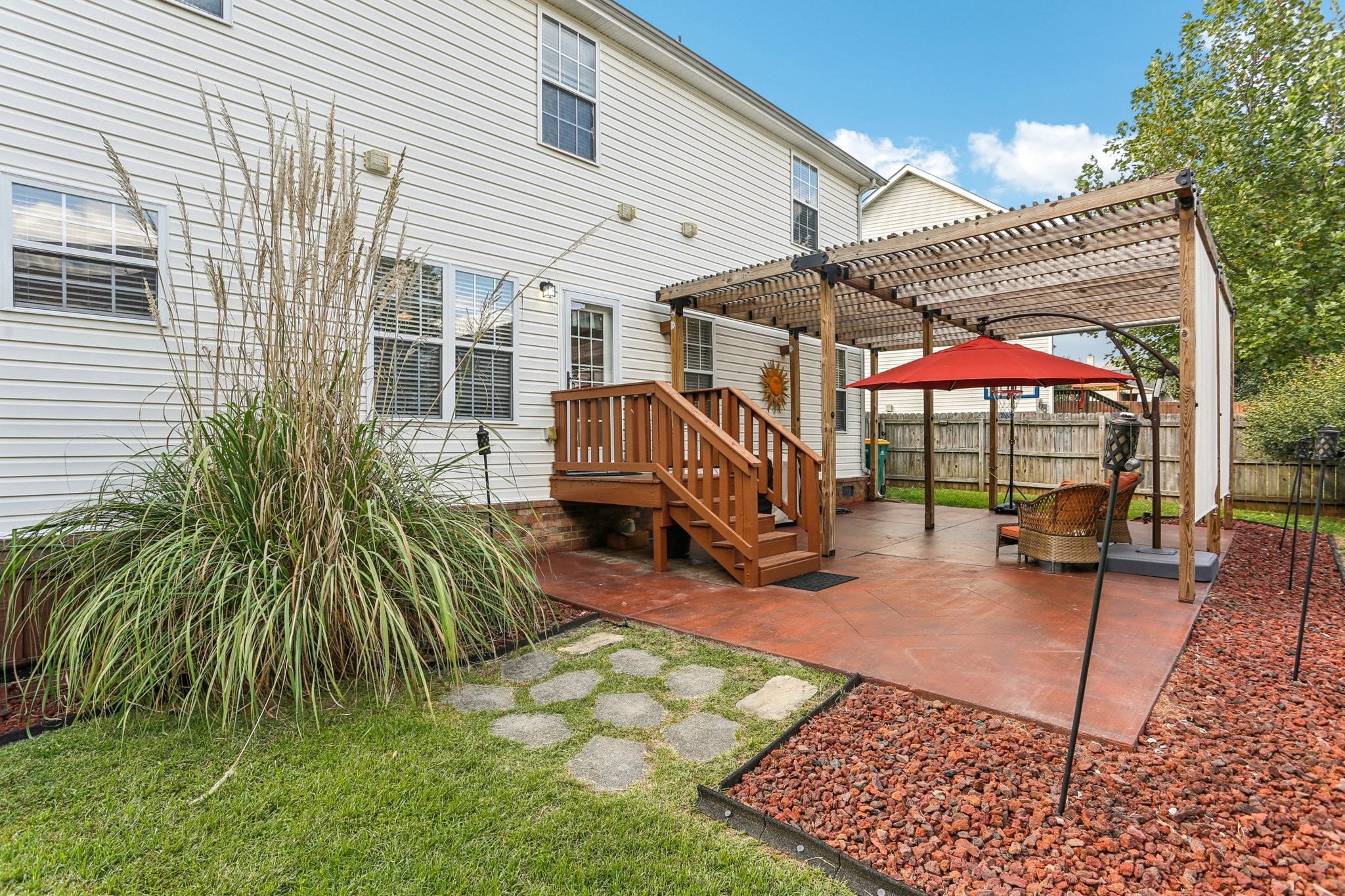 5017 Saunders Terrace Spring Hill, TN 37174 - Photo 48 of 52 a view of a backyard with a patio