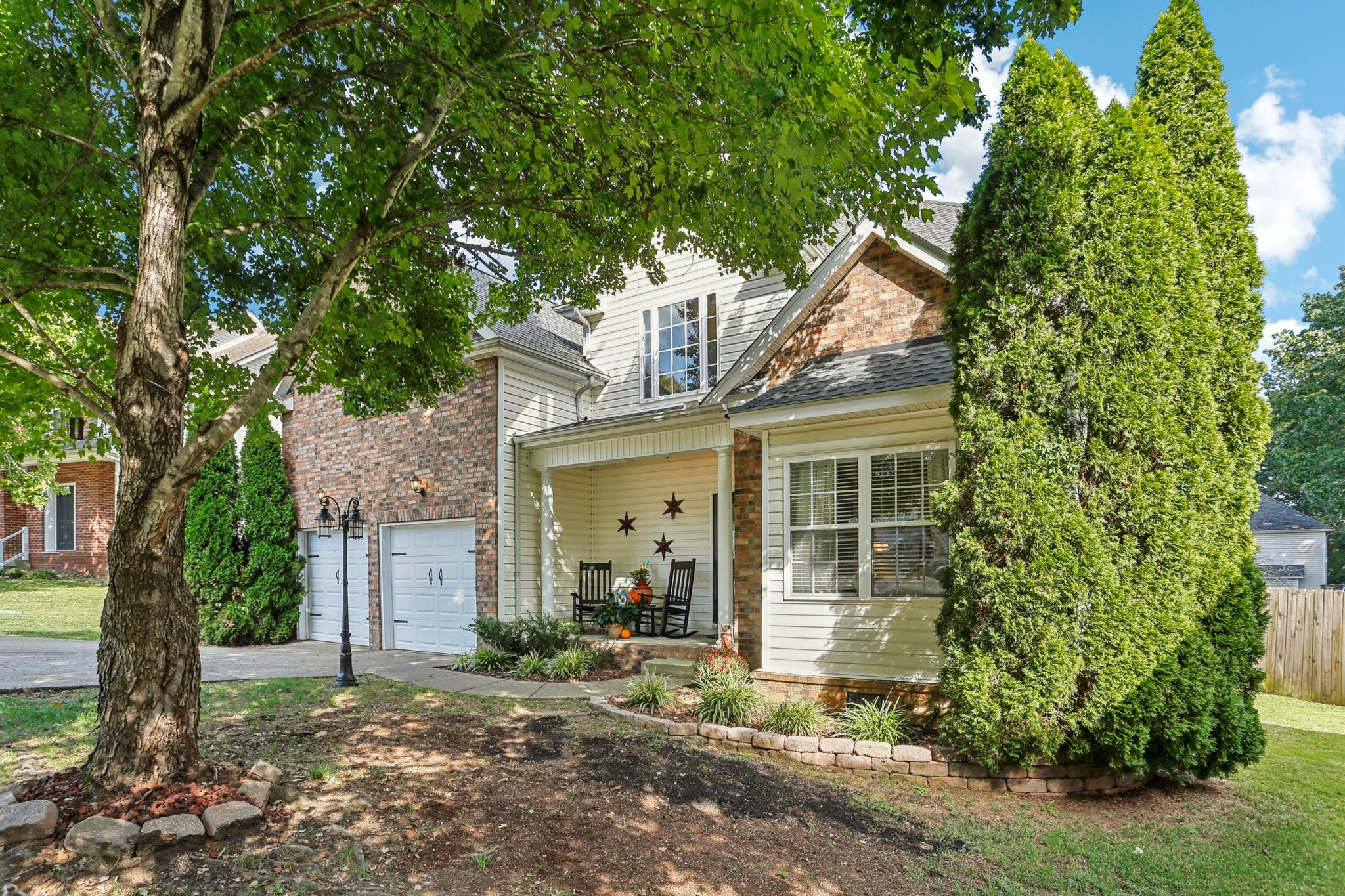 5017 Saunders Terrace Spring Hill, TN 37174 - Photo 50 of 52 a front view of a house with garden