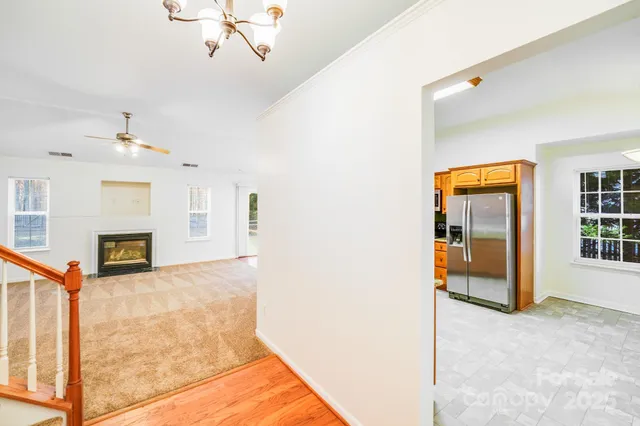 a bedroom with a bed and a fireplace