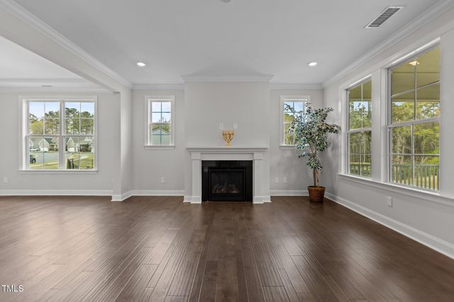 a kitchen with stainless steel appliances granite countertop cabinets and wooden floor