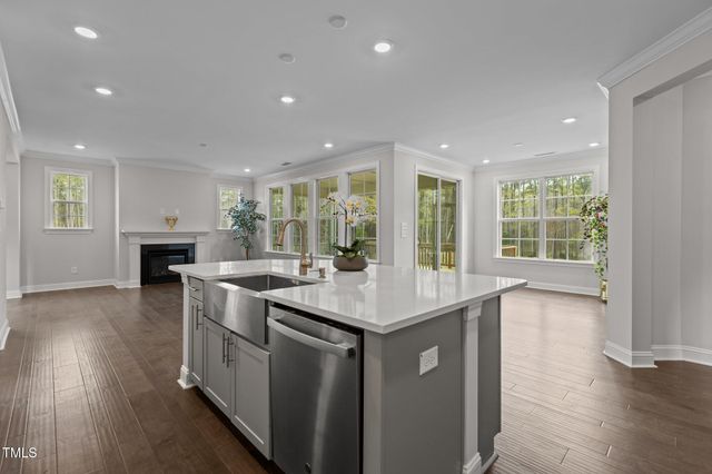 a bathroom with a sink a large mirror and a bathtub