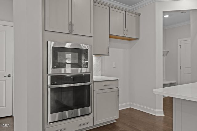 a view of staircase with rug