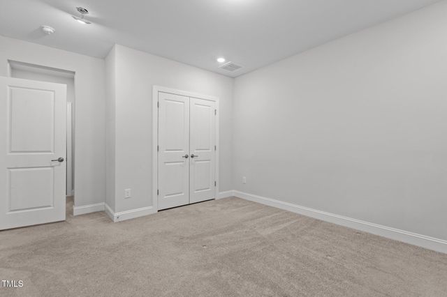 an aerial view of a house with a big yard