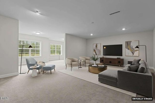 a view of a swimming pool and lounge chair