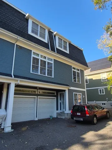 a car parked in front of a building