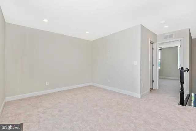 a view of a room with a hallway