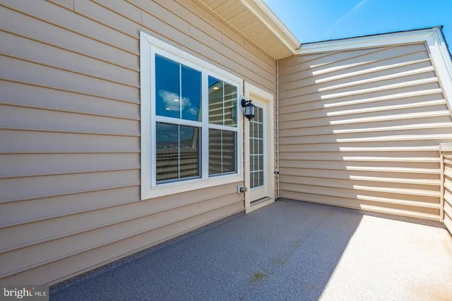 a view of a house with a large window