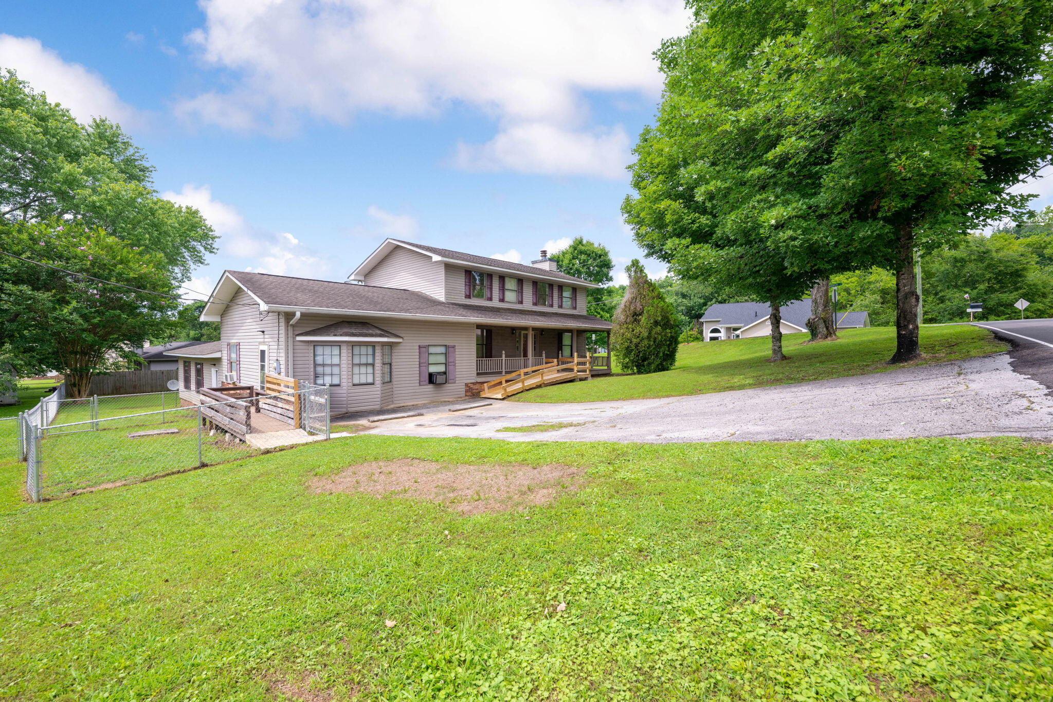 5642 Tucker Road Ooltewah, TN 37363 - Photo 2 of 52 driveway and fenced yard