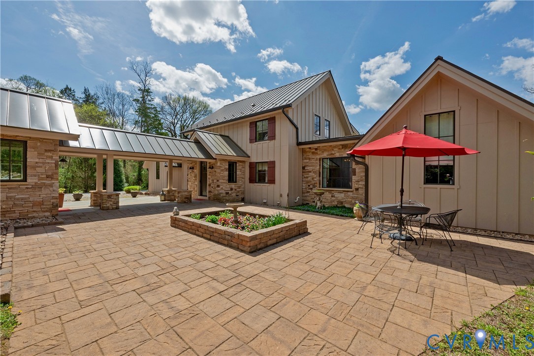 794 River Road West Manakin-Sabot, VA 23103 - Photo 69 of 82 Large paver patio with custom planters.