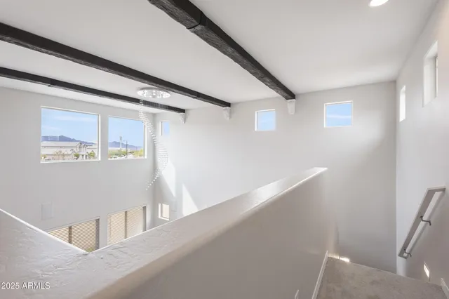 a bathroom with a granite countertop sink a toilet and a bathtub