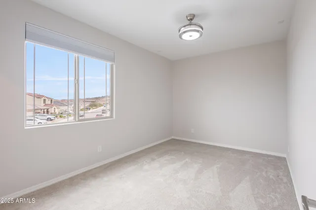 a view of a field with a big yard