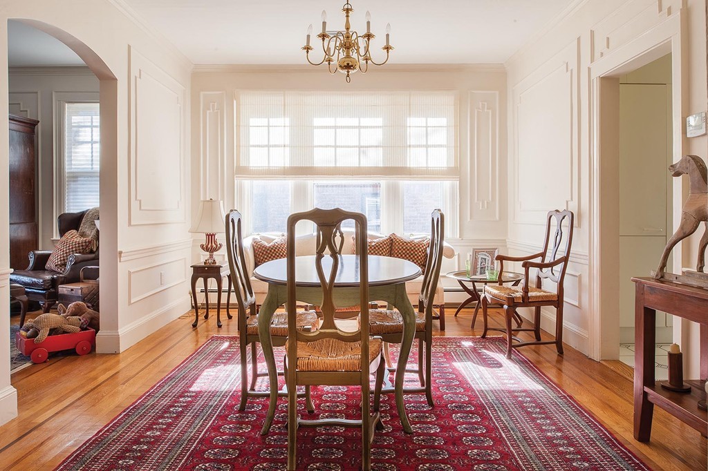 82 Atherton Road, Unit 2 Brookline, MA 02446 - Photo 6 of 9 a view of a dining room with furniture window and wooden floor