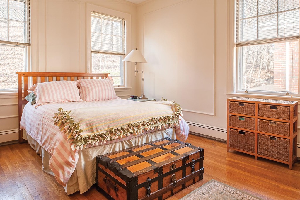 82 Atherton Road, Unit 2 Brookline, MA 02446 - Photo 8 of 9 a bedroom with a bed and window