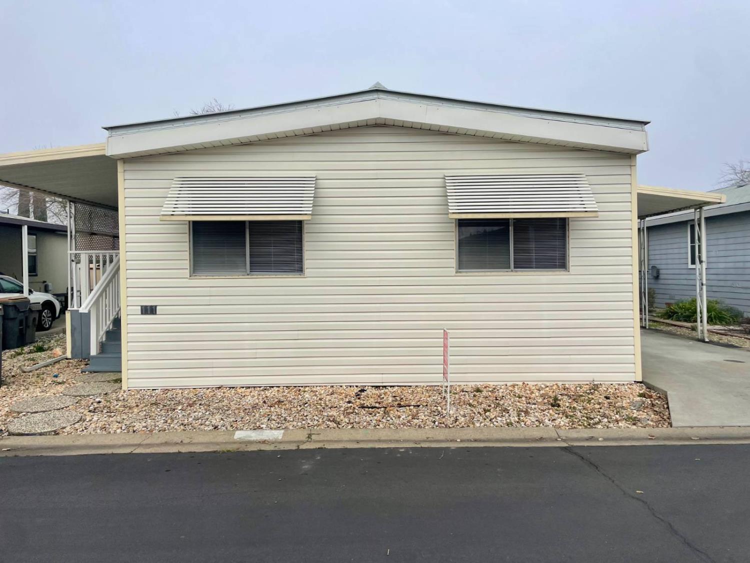 3901 Lake Road, Unit 111 West Sacramento, CA 95691 - Photo 1 of 16 a front view of a house