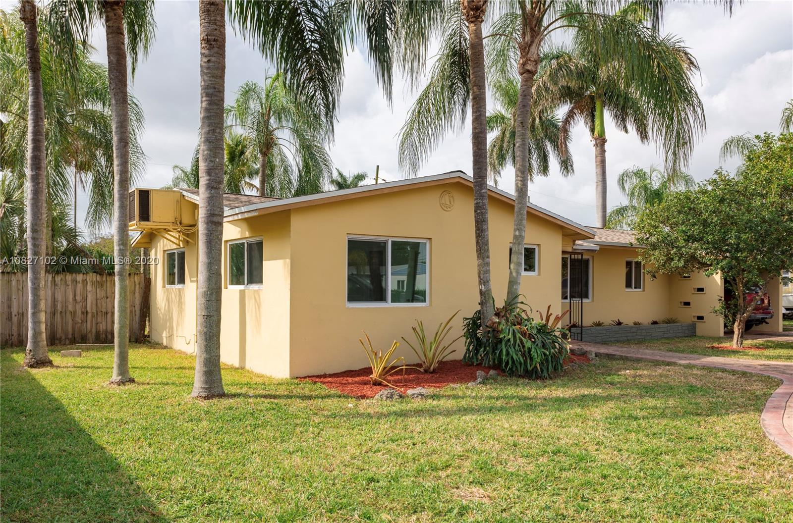3198 Arthur Terrace Hollywood, FL 33021 - Photo 11 of 18 a view of a house with backyard and plants