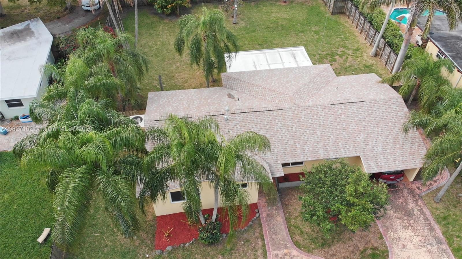 3198 Arthur Terrace Hollywood, FL 33021 - Photo 16 of 18 an aerial view of a house with a yard and garden